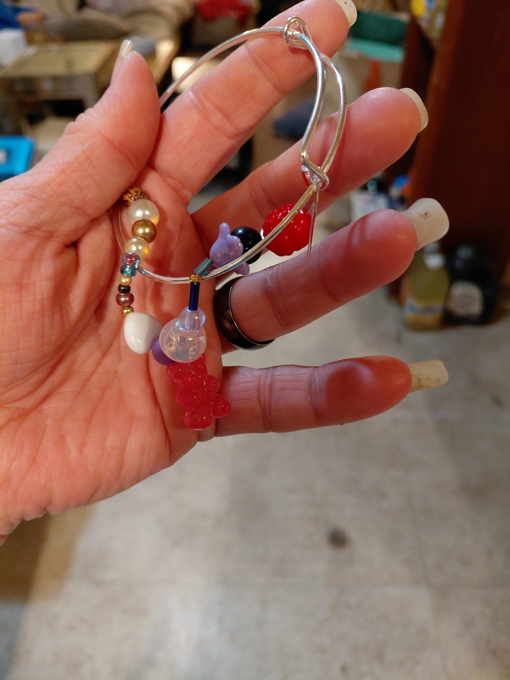 Handmade Silver Bangle Bracelet with Red Bead Charms